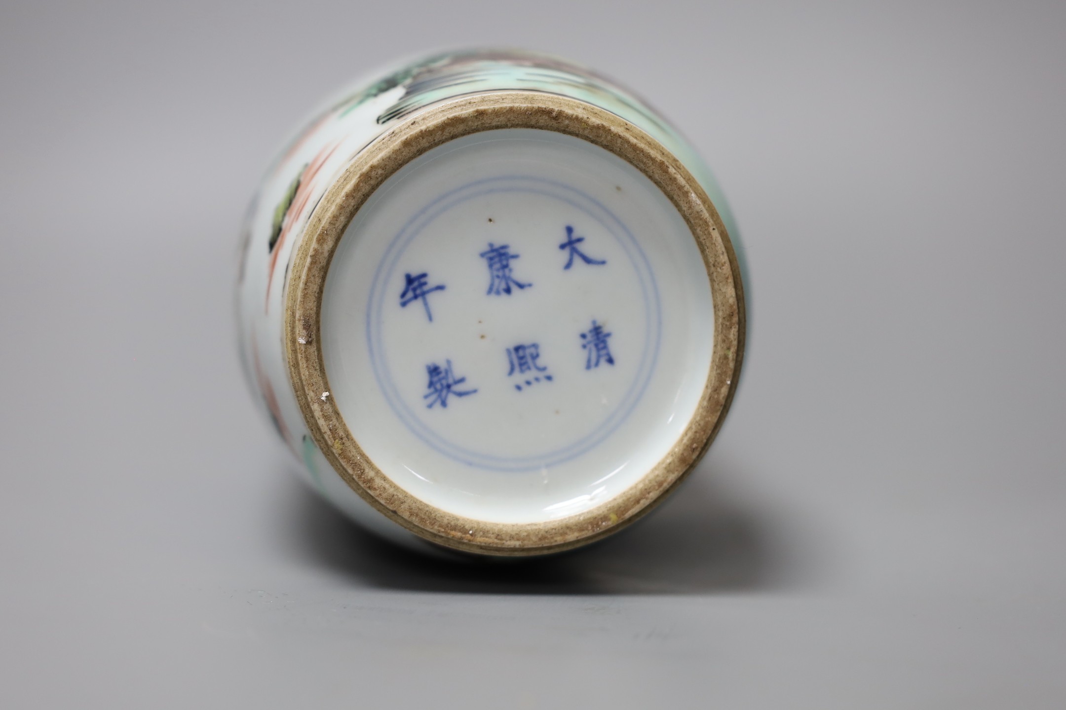 A Chinese famille verte figural rouleau vase, 22cm tall